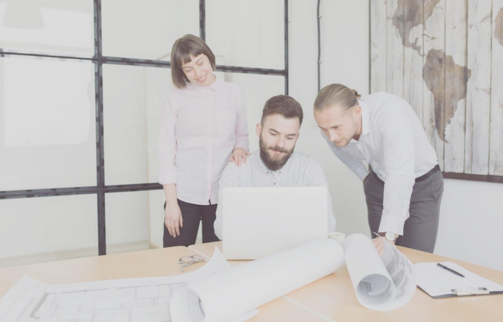 Students analyzing investment charts and market data during portfolio building workshop